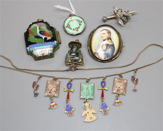 A white metal and enamel locket, a gilt metal and enamel necklace, two pendants, a brooch and 830 bug brooch, locket 24mm.